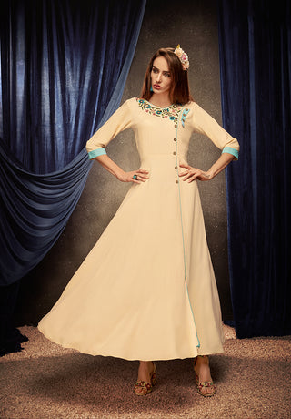 Monjolika Fashion Cream Embroidered Rayon Party Wear Kurti