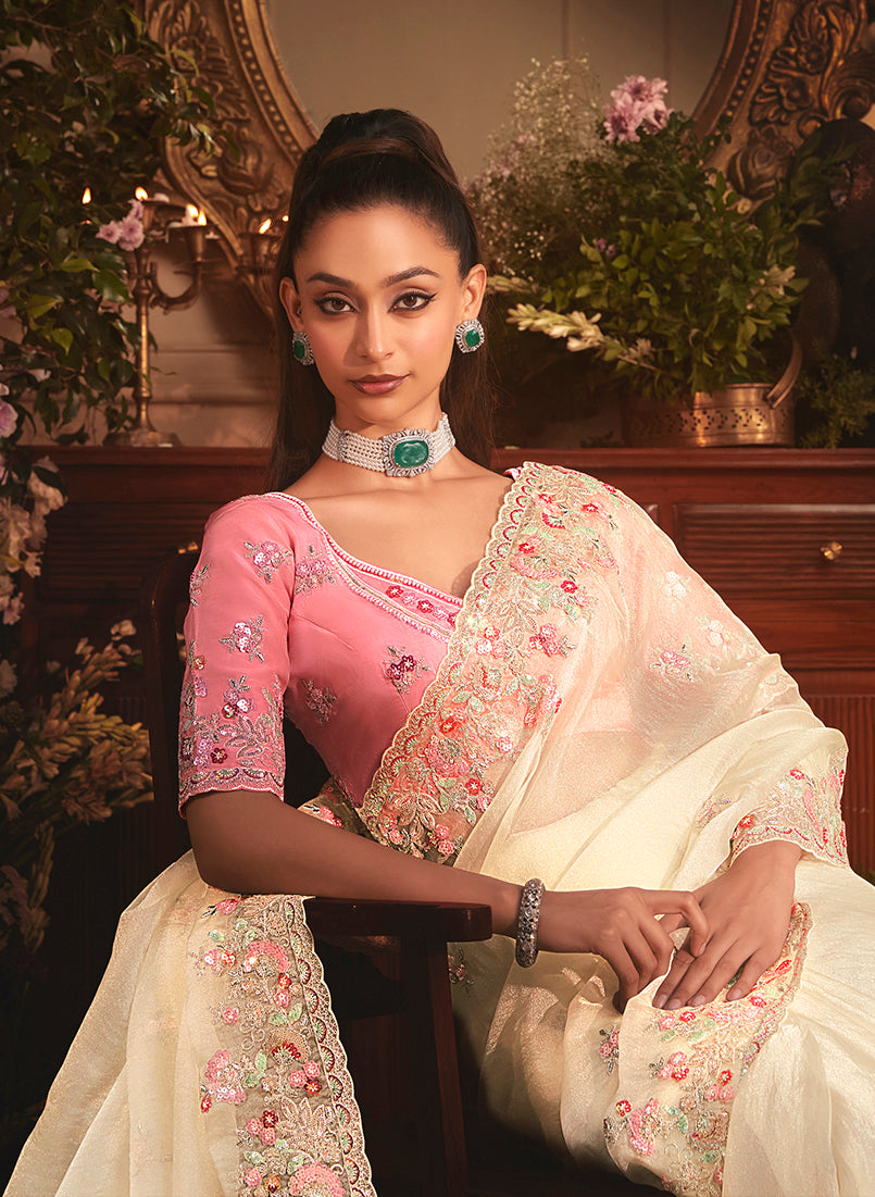 Monjolika Fashion Designer Cream Tissue Organza Saree With All Over Butta Work & Heavy Stone Embellished Border