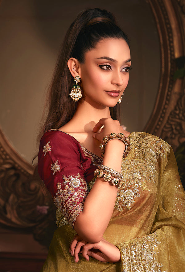 Monjolika Fashion Designer Golden Tissue Organza Saree With All Over Butta Work & Heavy Stone Embellished Border