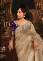 Thumbnail for Monjolika Fashion Designer Beige Tissue Organza Saree With All Over Butta Work & Heavy Stone Embellished Border