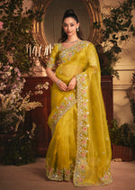Thumbnail for Monjolika Fashion Designer Mustard Tissue Organza Saree With All Over Butta Work & Heavy Stone Embellished Border
