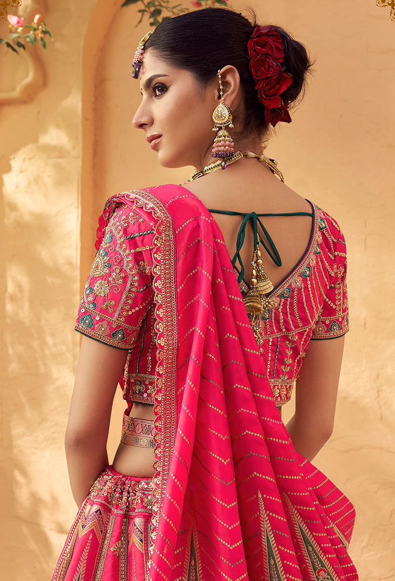 Monjolika Fashion Hot Pink & Peach Banarasi Silk Wedding Wear Lehenga With Embroidery Work