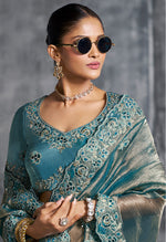 Thumbnail for Monjolika Fashion Teal Blue Tissue Traditional Saree with Embroidered, Resham and Thread Work for Ceremonial