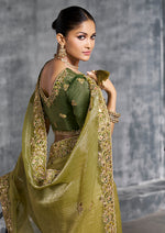 Thumbnail for Monjolika Fashion Olive Green Tissue Traditional Saree with Embroidered, Resham and Thread Work for Ceremonial