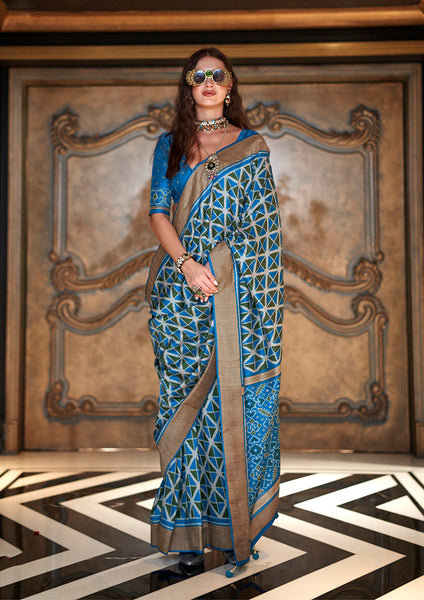 Monjolika Fashion Aqua Blue Double Ikkat Silk Blend Foil Printed Saree
