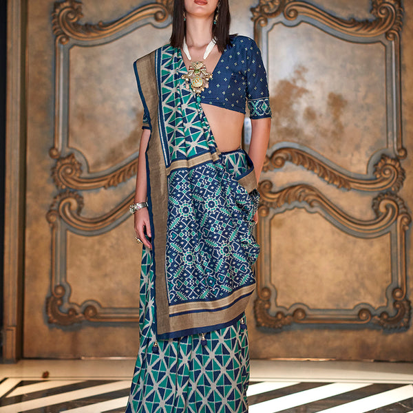 Monjolika Fashion Teal Double Ikkat Silk Blend Foil Printed Saree