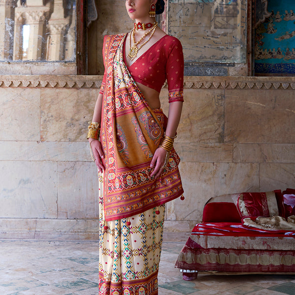 Monjolika Fashion Silk Blend Cream and Red Patola Print Classic Festival Wear Saree