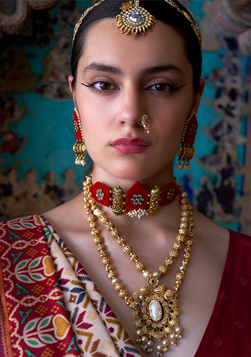 Monjolika Fashion Silk Blend Cream and Red Patola Print Classic Festival Wear Saree