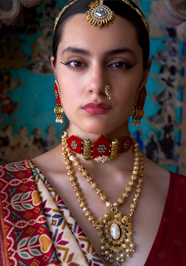 Monjolika Fashion Silk Blend Cream and Red Patola Print Classic Festival Wear Saree