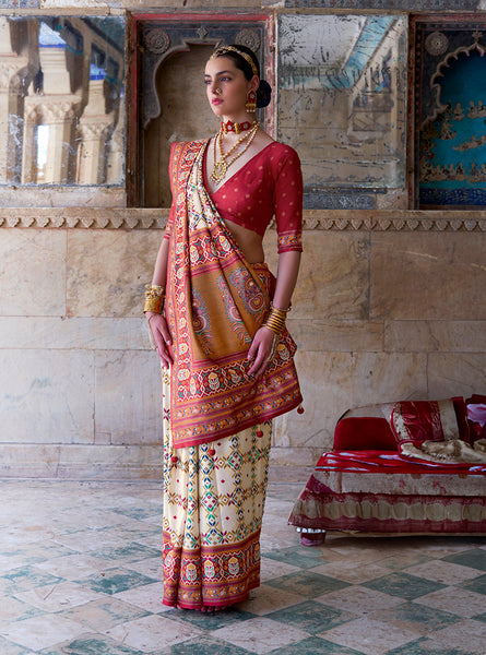 Monjolika Fashion Silk Blend Cream and Red Patola Print Classic Festival Wear Saree