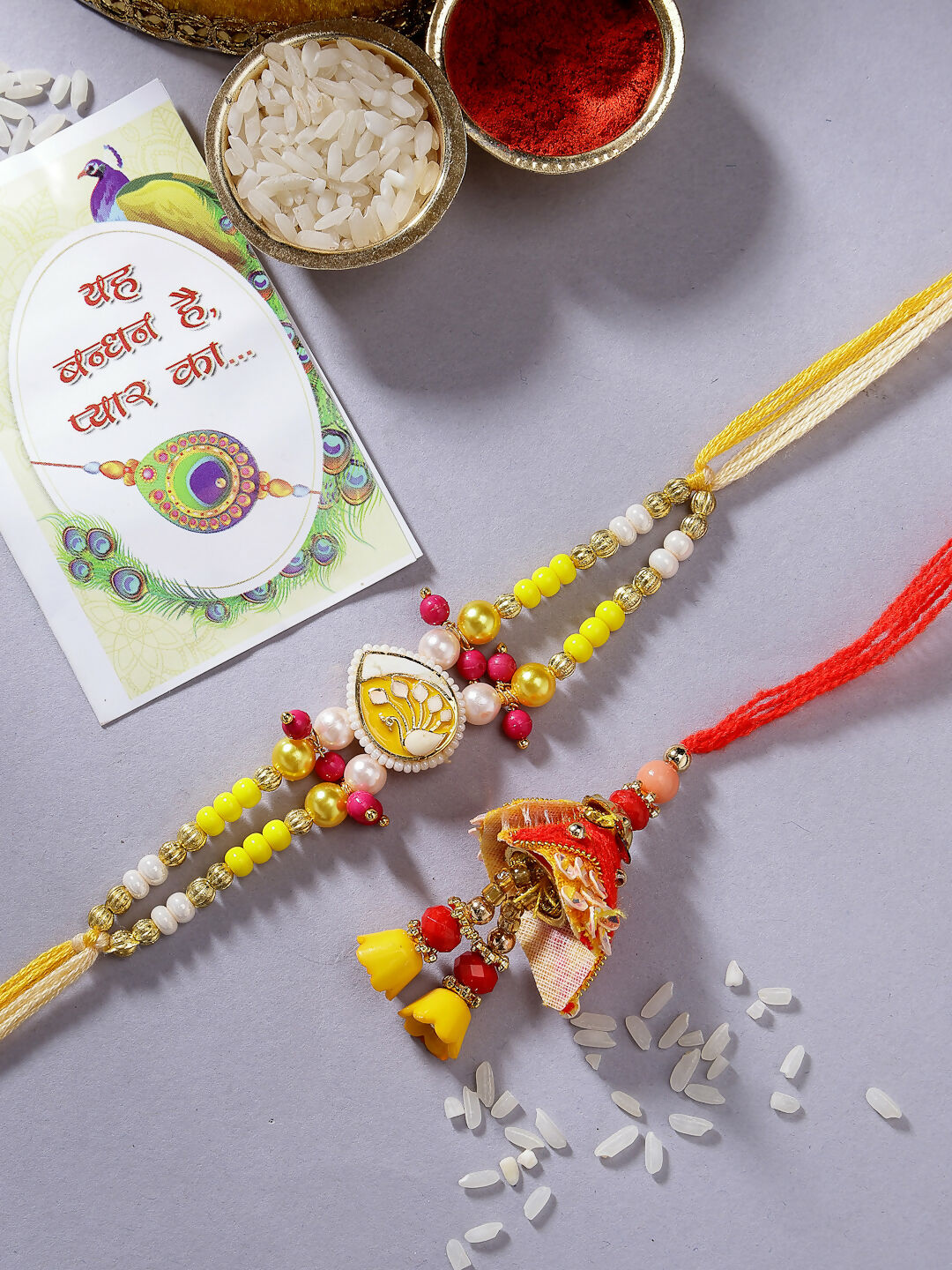 NVR Women & Men Set of 2 Yellow Peacock Design Bhaiya Bhabhi Rakhi With Roli Chawal & Chocolate - Distacart