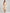 AURELIA Women Off-White & Rust Orange Side Flap Detail Printed Empire Dress