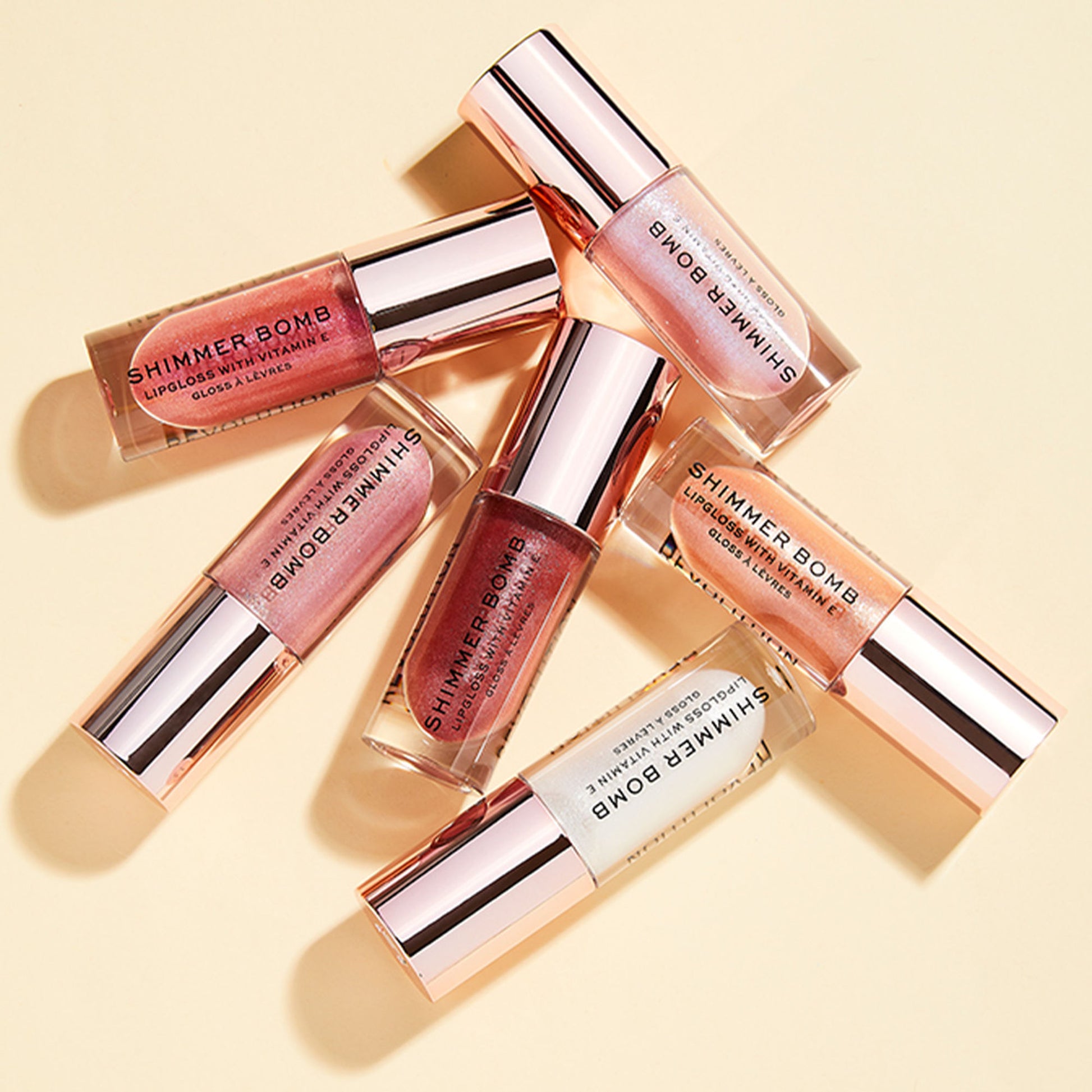 Makeup Revolution Shimmer Bomb Lipgloss-Infused With Vitamin E For Extra Nourishment - Glimmer Nude - Distacart