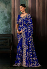 Thumbnail for Monjolika Fashion Royal Blue Faux Crepe Embroidery Bridal Reception Festival Wedding Wear Heavy Border Saree - Distacart