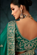 Thumbnail for Monjolika Fashion Teal Green Faux Satin Embroidery Bridal Reception Festival Wedding Wear Heavy Border Saree - Distacart
