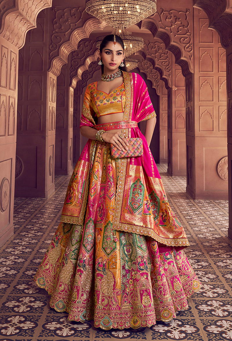 Monjolika Fashion Multi Colour Banarasi Silk Blend Embroidered, Sequins, Swarovski and Weaving Work Lehenga Choli