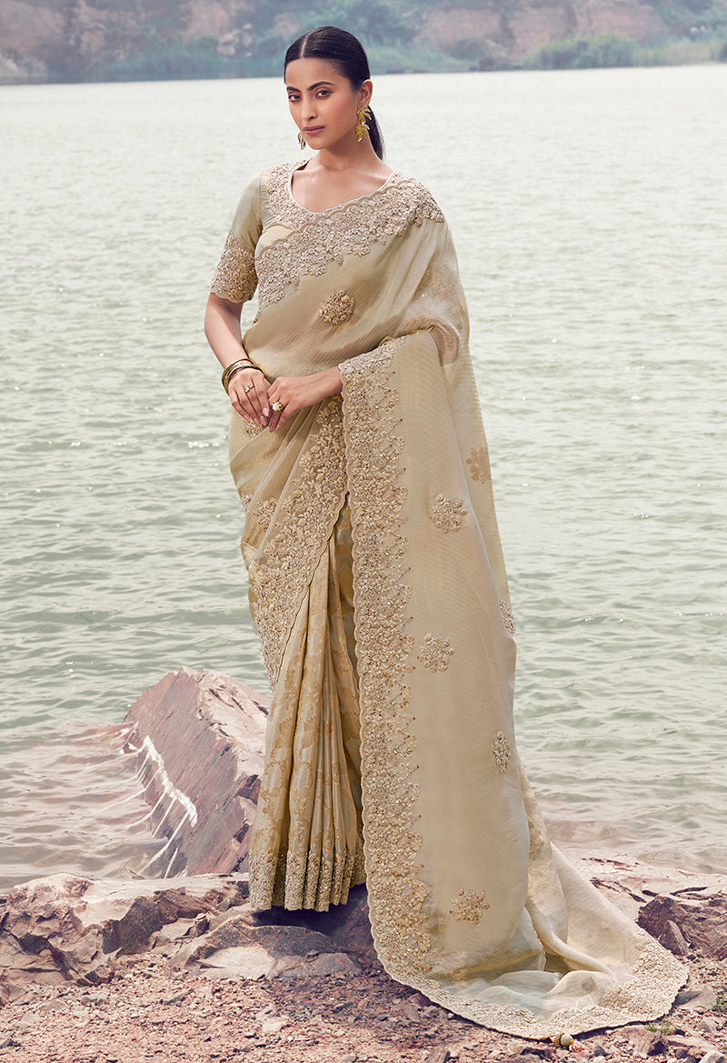 Monjolika Fashion Beige Embroidered Woven Faux Tissue Silk Saree - Dista