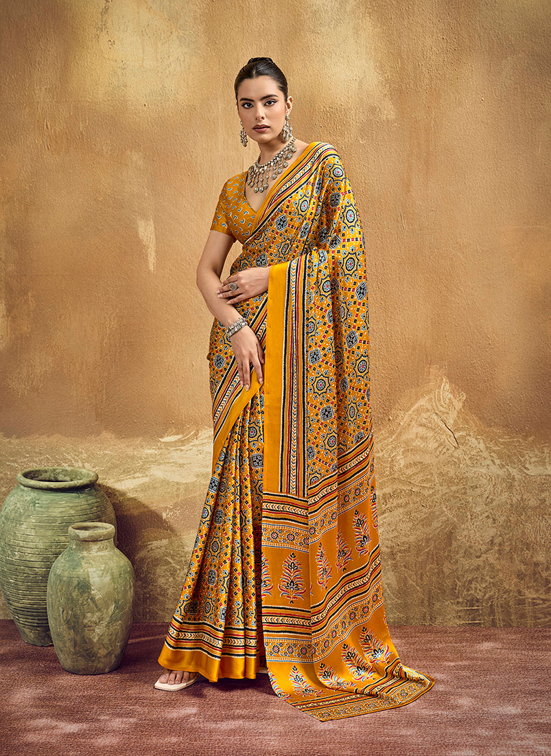 Monjolika Fashion Mustard Pink Faux Satin Printed Ajrakh Saree With Rich Border Print