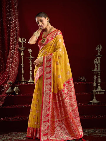 Monjolika Fashion Mustard Soft Banarasi Silk Blend Zari Woven Saree With Blouse Piece - Dista