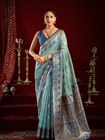 Monjolika Fashion Light Blue Soft Banarasi Silk Blend Zari Woven Saree With Blouse Piece - Dista