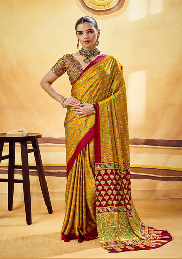 Monjolika Fashion Mustard Satin Printed Saree With Orange Border And Unstiched Blouse - Dista