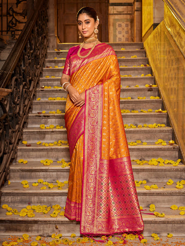 Monjolika Fashion Orange Banarasi Silk Blend Saree with Magenta Zari Border - Dista