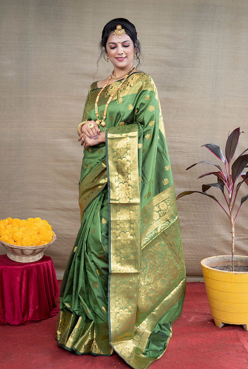 Monjolika Fashion Green Banarasi Silk Blend Saree With Golden Zari Work - Dista