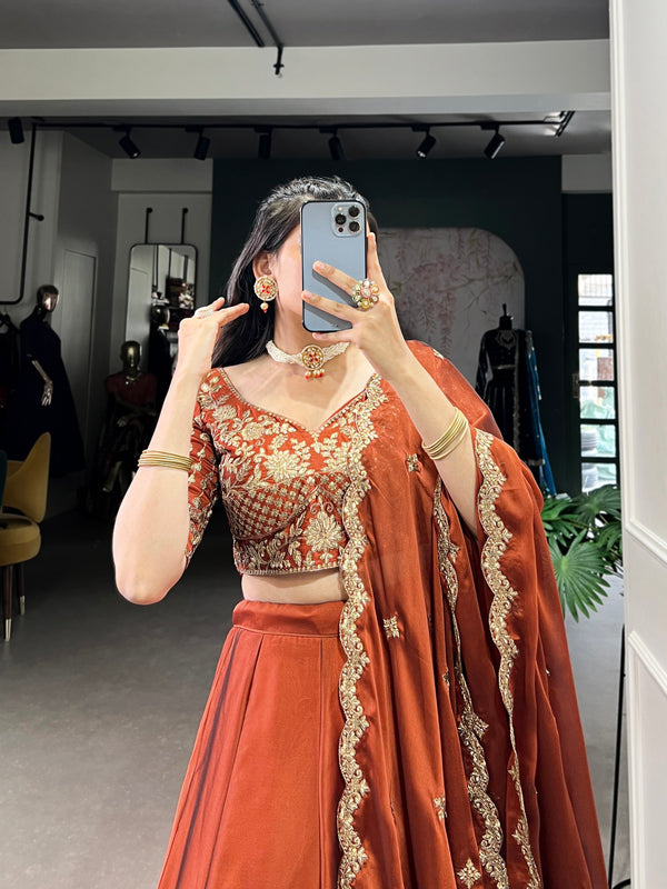 Pramukh Fab Dusty Orange Color Rangoli Silk Lehenga Choli