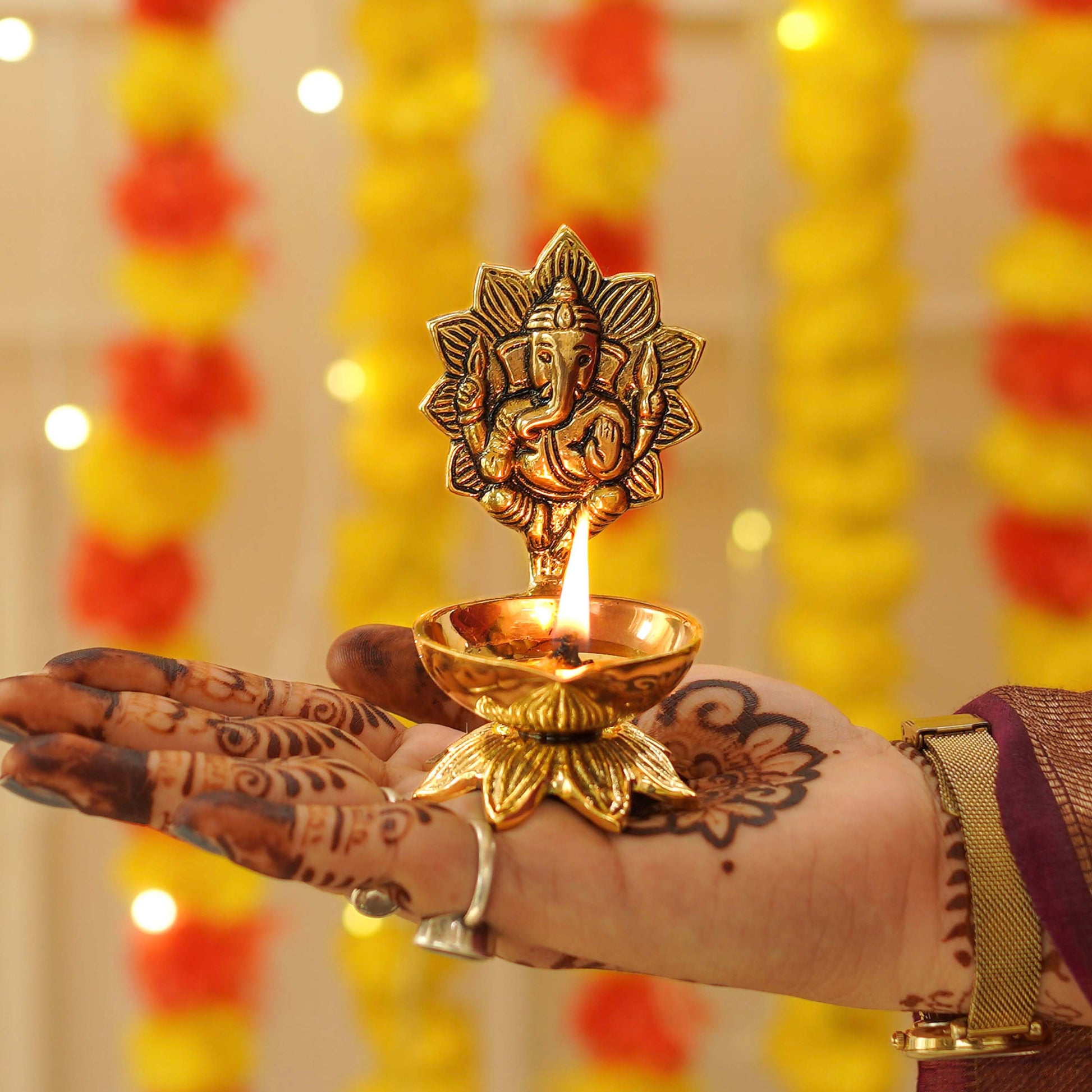 brass ganesh diya