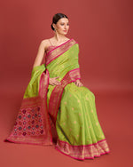 Thumbnail for Monjolika Fashion Exquisite Designs With This Regal Parrot Green Patola Pallu Banarasi Tissue Silk Saree - Distacart