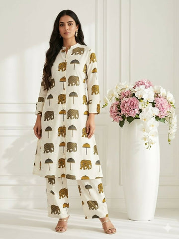 Teeya Creation Women New Trendy Off-White & Mustard Yellow Elephant Print Cotton Kurta with Palazzos - Dista