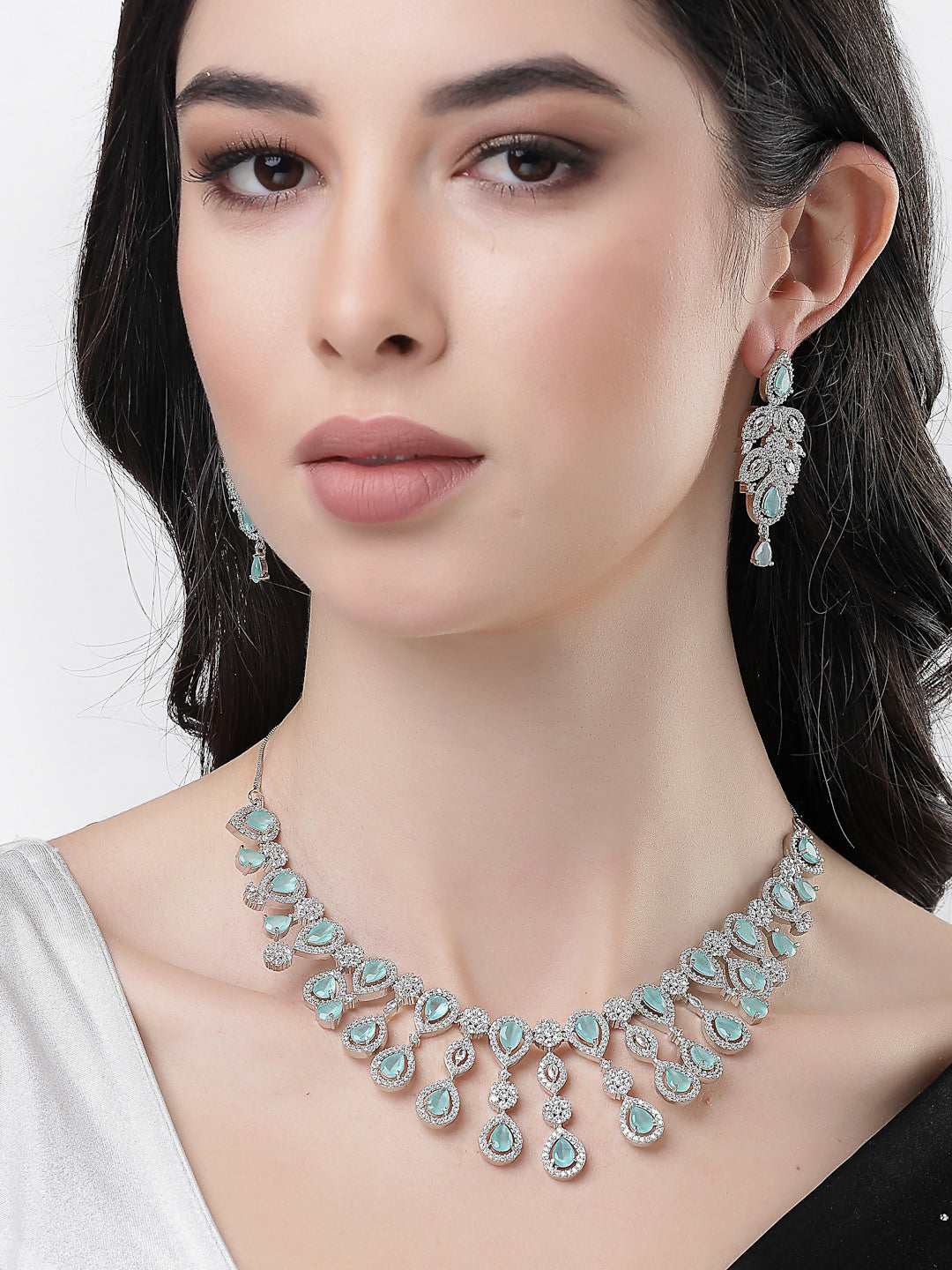 NVR Women's silver plated Turquoise CZ stone handcrafted jewellery set - Distacart