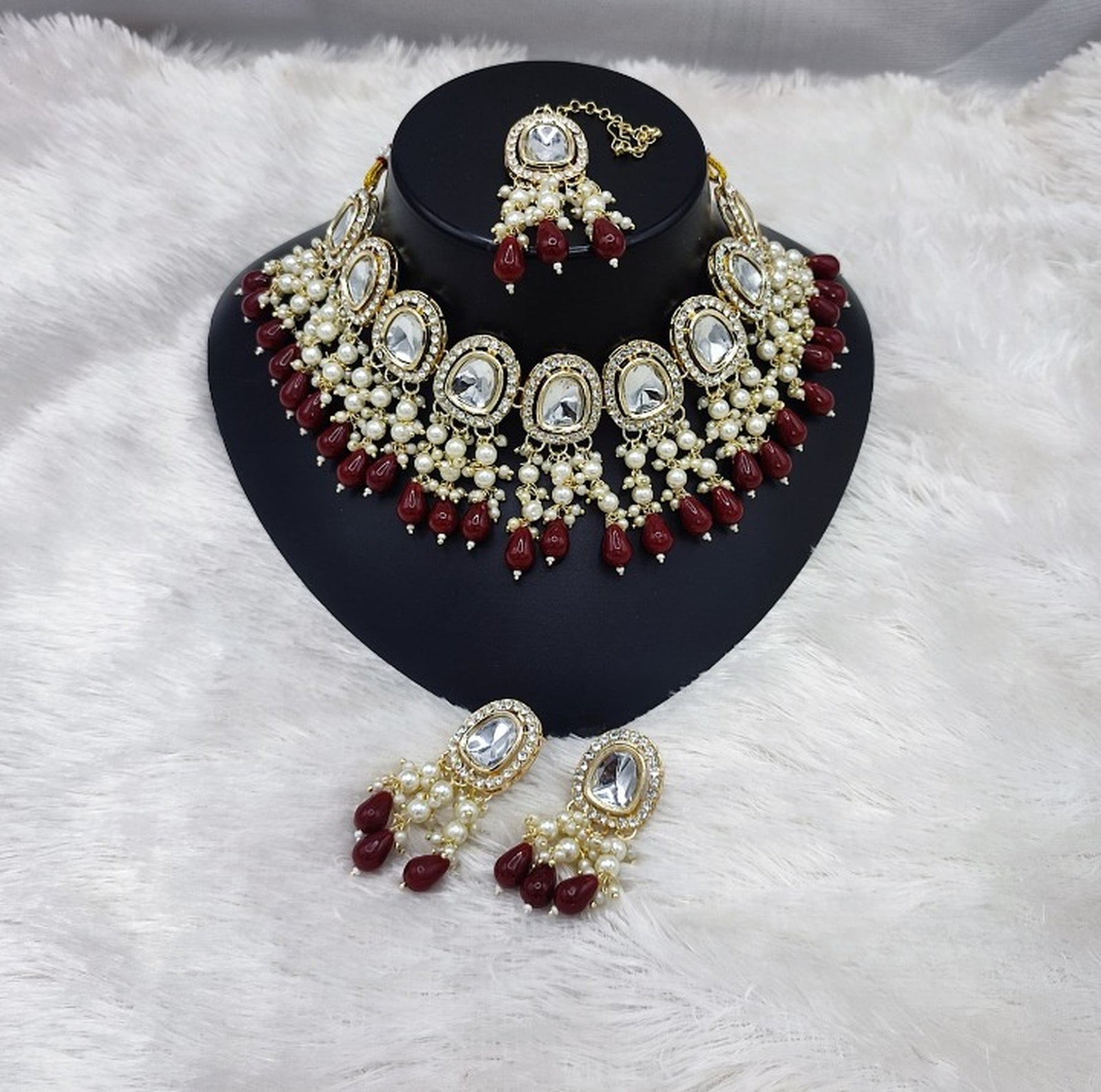 Jewel City Elegant Kundan Pearl Necklace Set with Maroon Drops and Matching Tikka