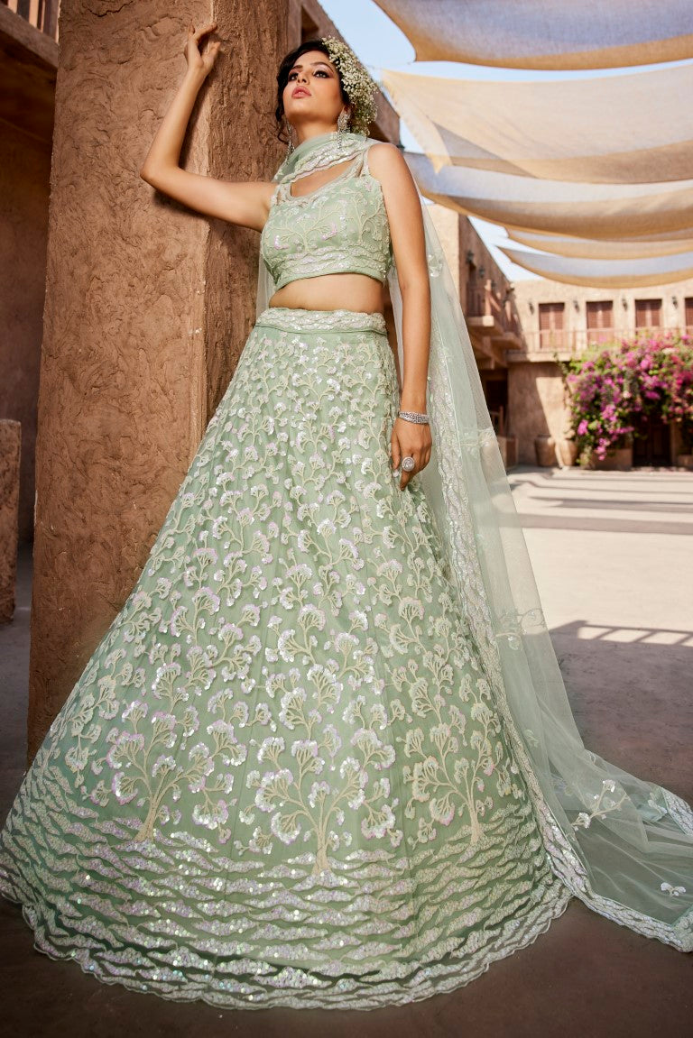 Aastha Fashion Lime Green Net Embroidery Lehenga Choli