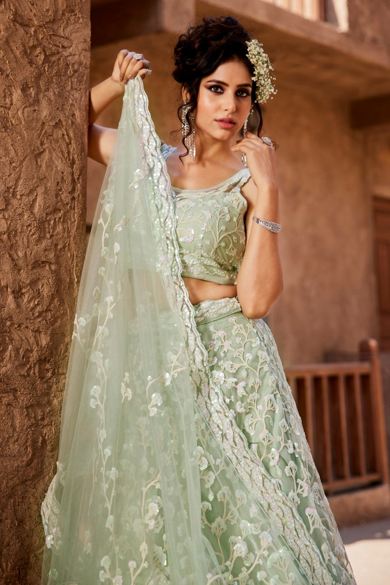 Aastha Fashion Lime Green Net Embroidery Lehenga Choli