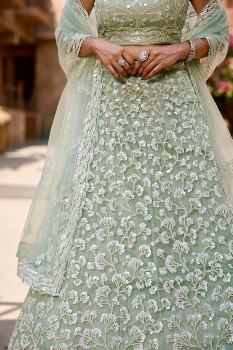 Aastha Fashion Lime Green Net Embroidery Lehenga Choli