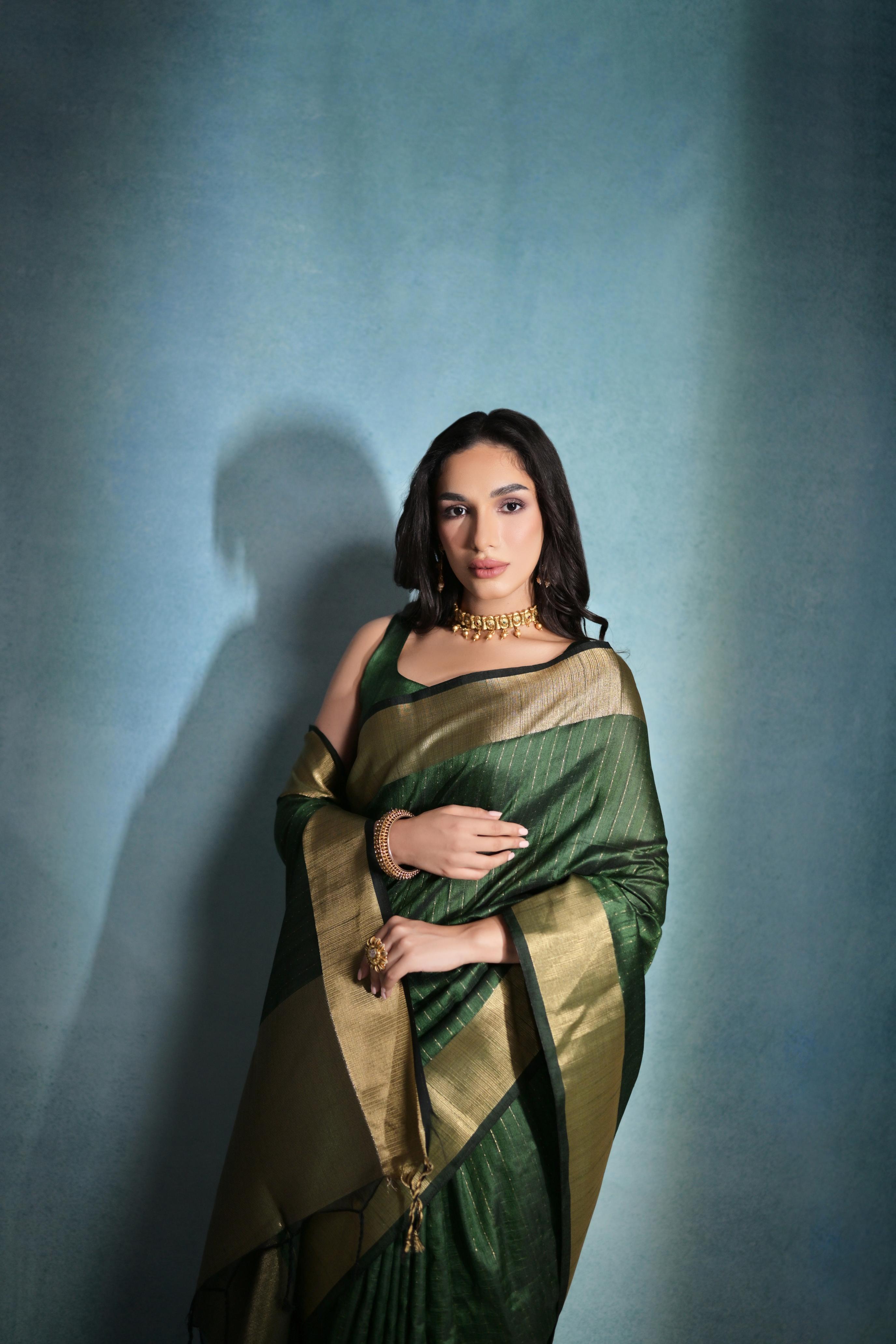 Aastha Fashion Green Banarasi Raw Silk Over Zari Linning Pattern Saree