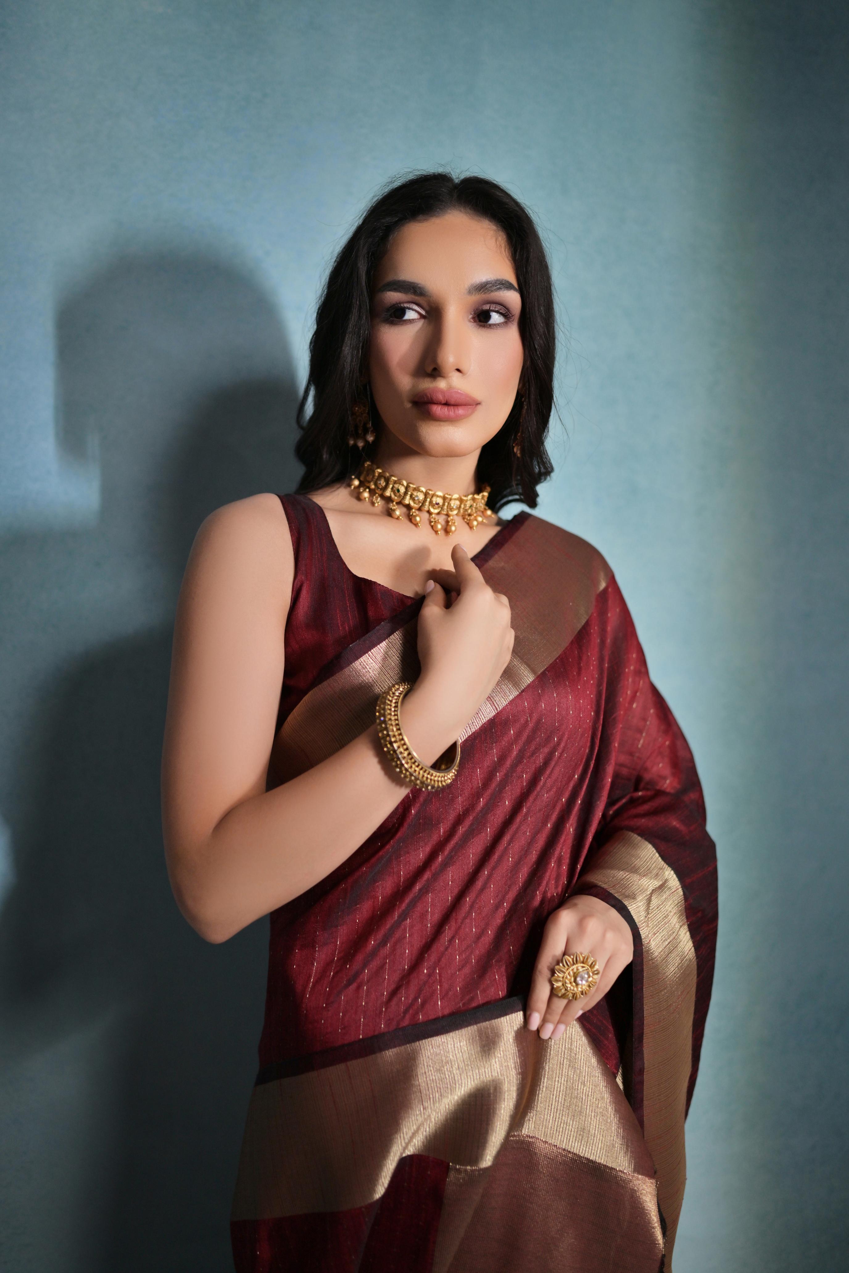 Aastha Fashion Maroon Banarasi Raw Silk Over Zari Linning Pattern Saree