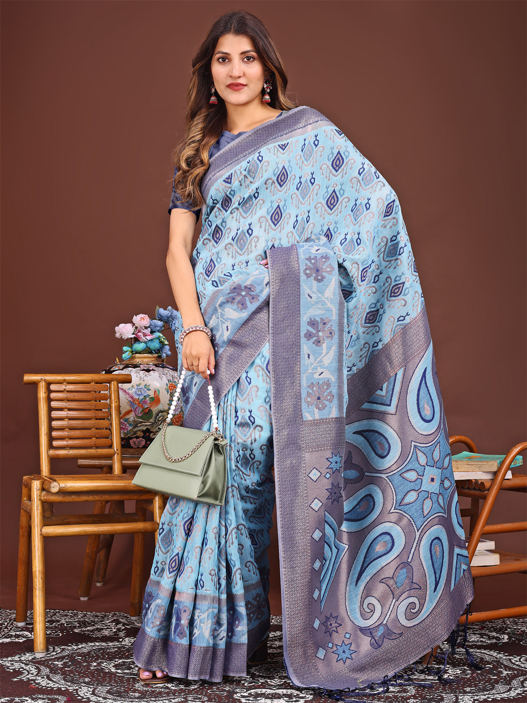 Astita Grace in Every Thread: Sky Blue Patola Linen Cotton Saree Woven with Cultural Elegance - Distacart