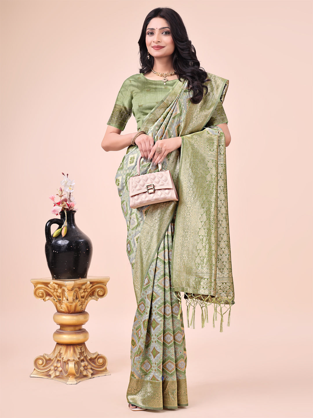 Astita Graceful Mehndi Green Lichi Silk Saree with Contrast Blue Woven Border & Floral Zari Design - Wedding & Festive Wear - Distacart