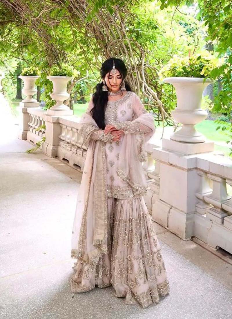 Prazu Fashion Light Peach Faux Georgette Embroidered Sharara Suit