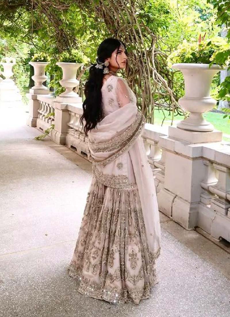 Prazu Fashion Light Peach Faux Georgette Embroidered Sharara Suit