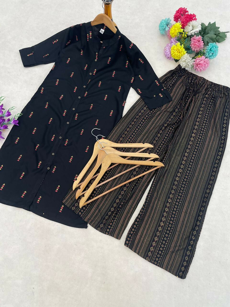 Teeya Creation Classic Black Cotton Kurta Set With Subtle Embroidery And Printed Palazzos - Dista