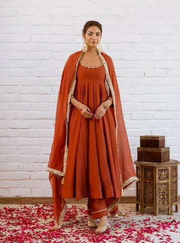 Teeya Creation Rust Orange Solid Anarkali Kurta With Pants And Dupatta Set - Dista
