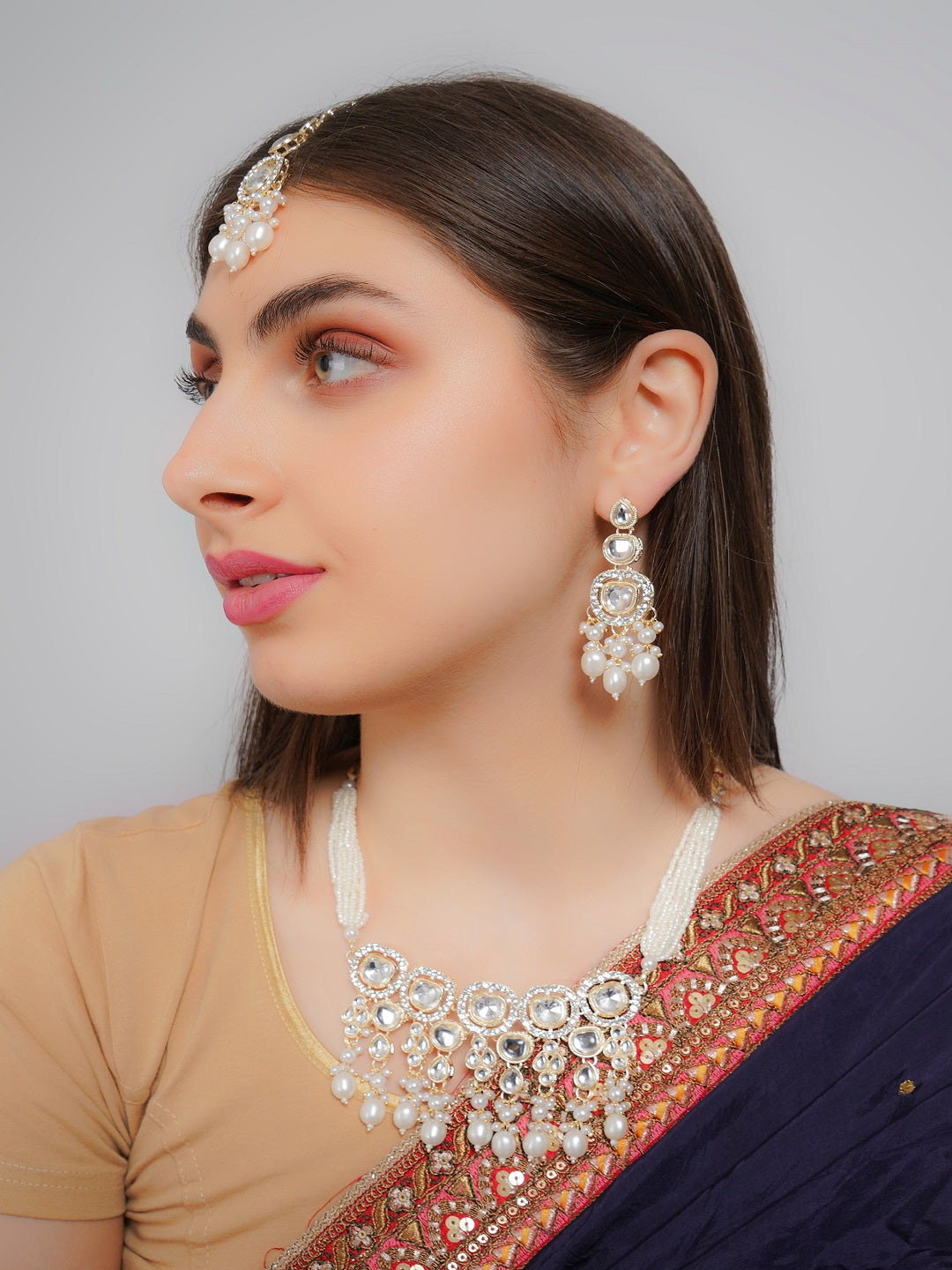 Divisha Alloy Gold-plated White Artificial Pearl Jewellery Set