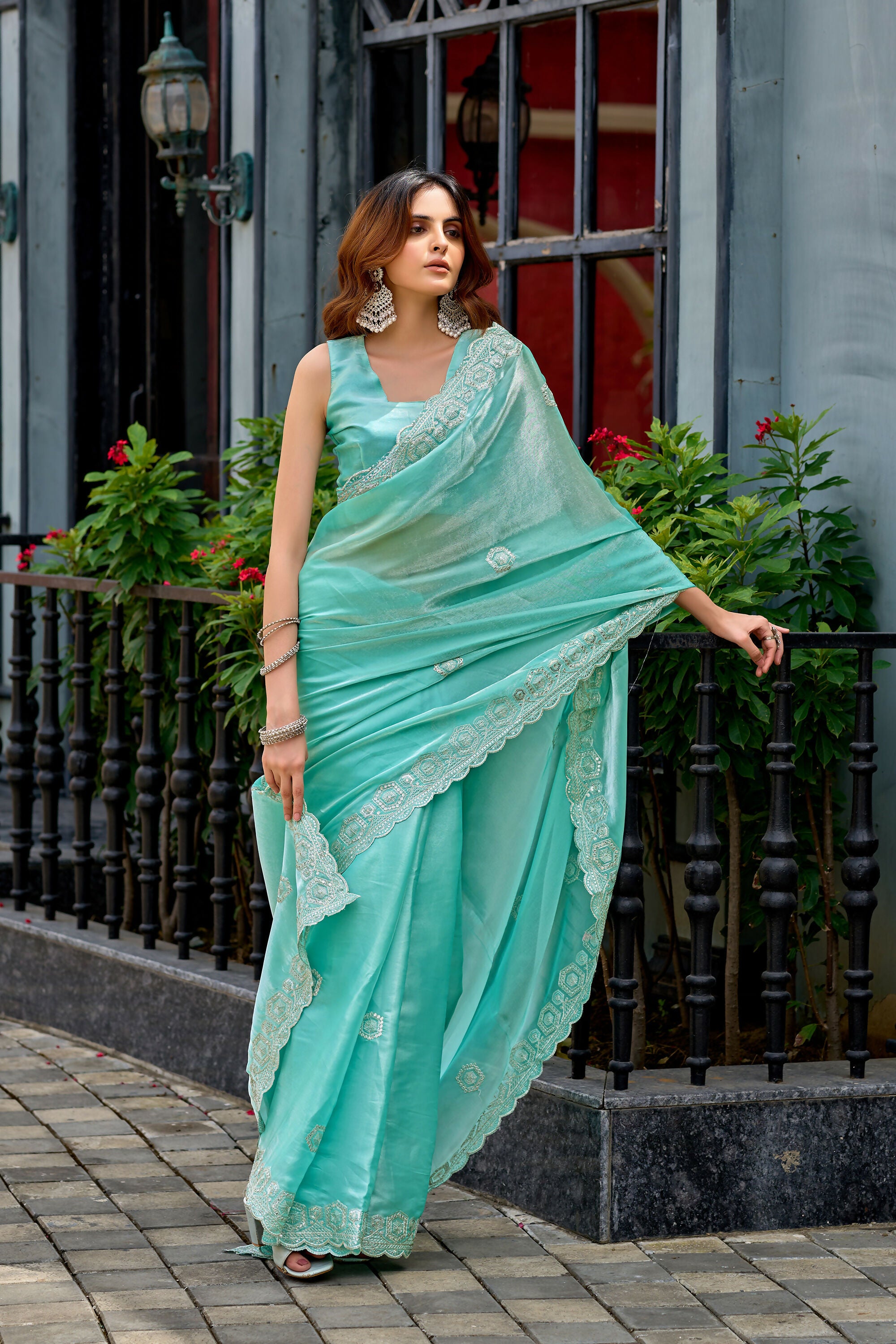 Vastranavya Turquoise Embroidery Work Shimmer Chiffon Saree with Unstitched Blouse