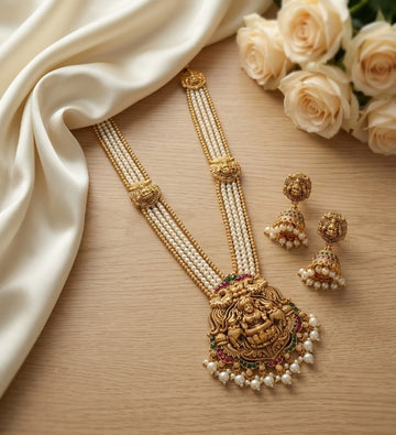 Jewel City Gold Plated South Indian Temple Jewelry Set - Pearl Mala Long Haram Necklace with Jhumka Earrings for Wedding - Dista