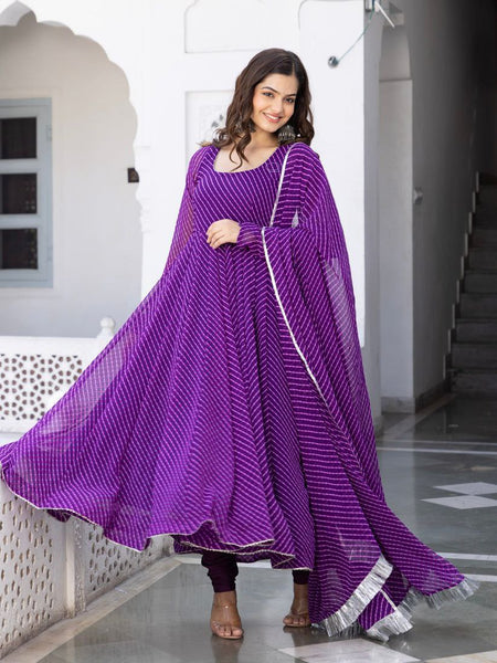 Floral Printed Knee Length Elbow Length Sleeves Round Neck Kurti And Palazzo Set With Net Dupatta (Purple) - Hiral Fashion