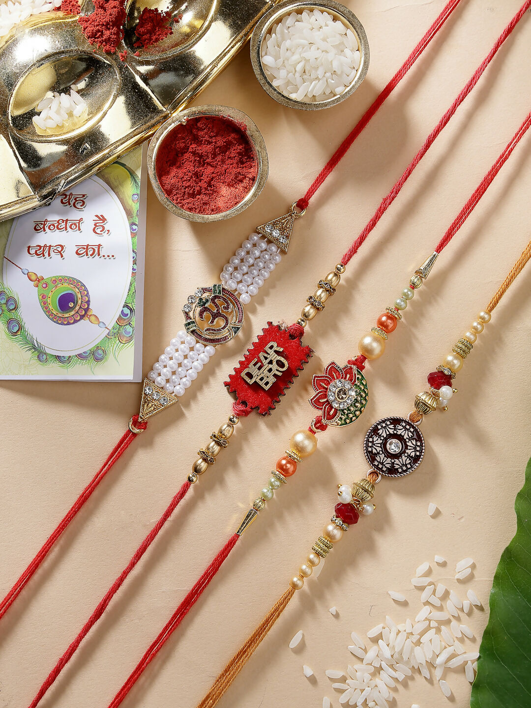 NVR Men Set of 4 Gold-Toned Stone-Studded & Beaded Rakhi With Roli Chawal & Chocolate - Distacart