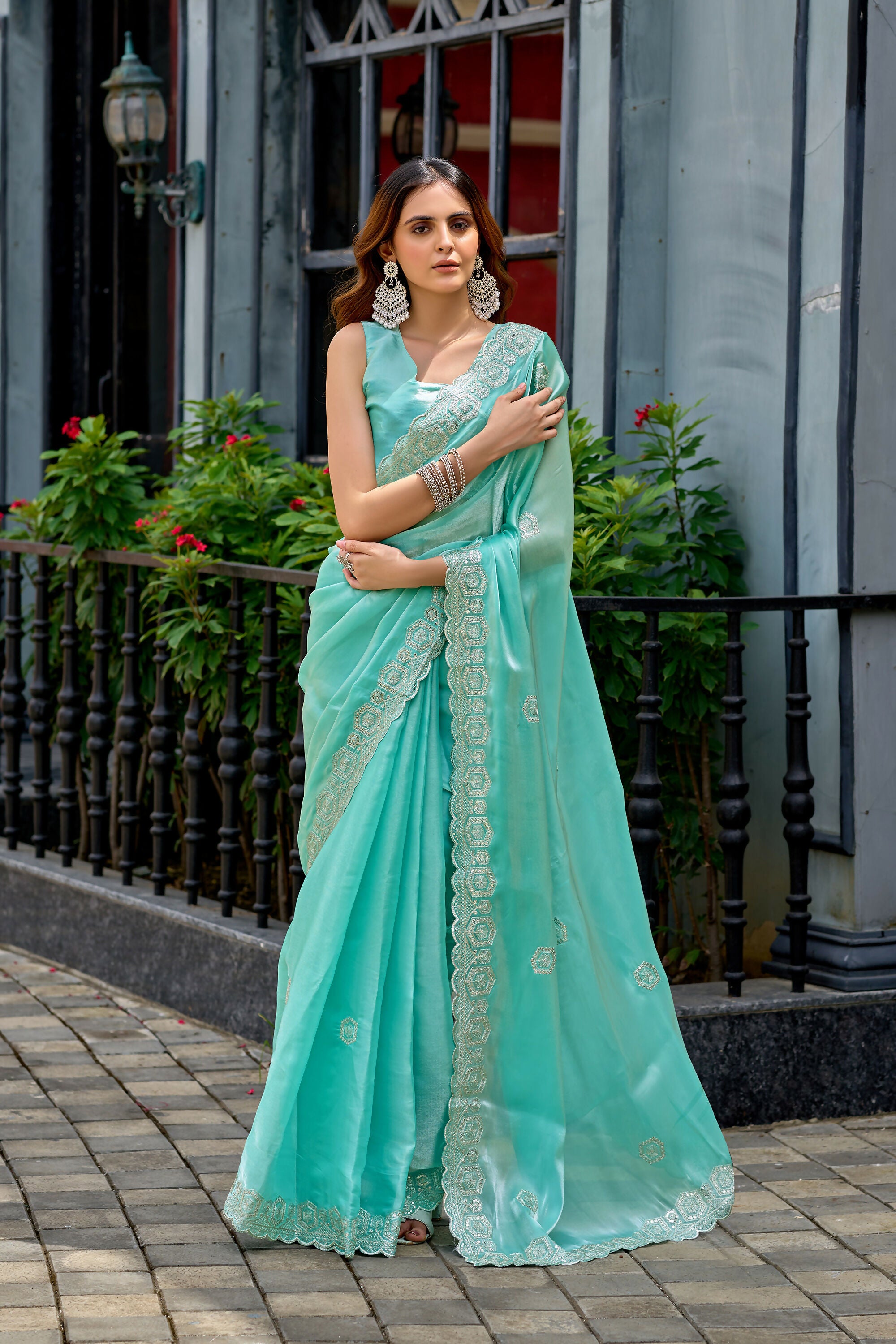 Vastranavya Turquoise Embroidery Work Shimmer Chiffon Saree with Unstitched Blouse